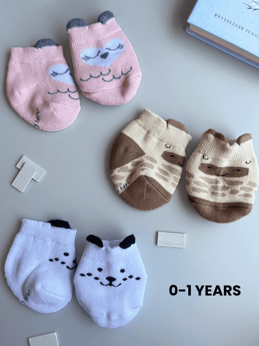 Air Garb baby combo socks for infants 0-1 years; a 3-pair set of soft cotton socks featuring pink owl, brown giraffe, and white dog animal face designs.